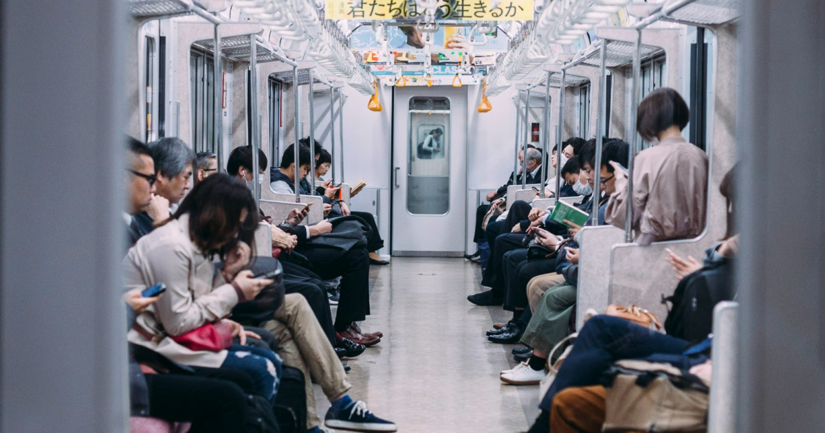 People in the train with different income in Tokyo, Japan