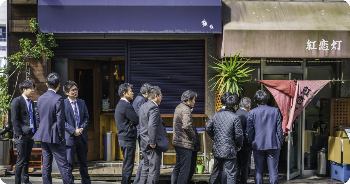 working man waiting to eat in Japan